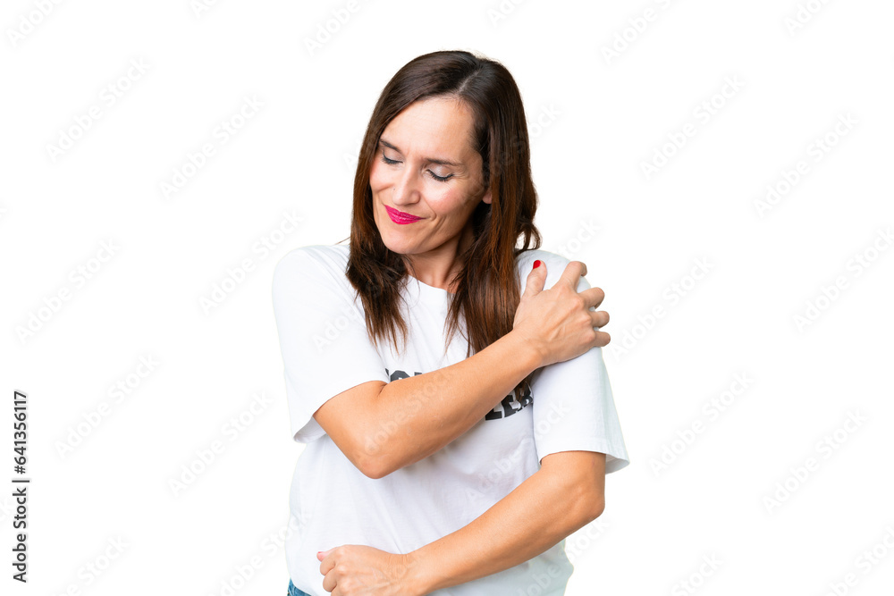 Middle age volunteer woman over isolated chroma key background suffering from pain in shoulder for having made an effort Middle age volunteer woman over isolated chroma key background suffering from pain in shoulder for having made an effort
