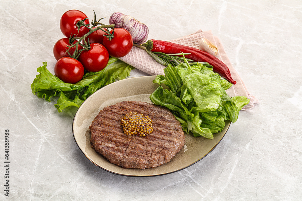 Frilled beef burger cutlet with iceberg Frilled beef burger cutlet with iceberg