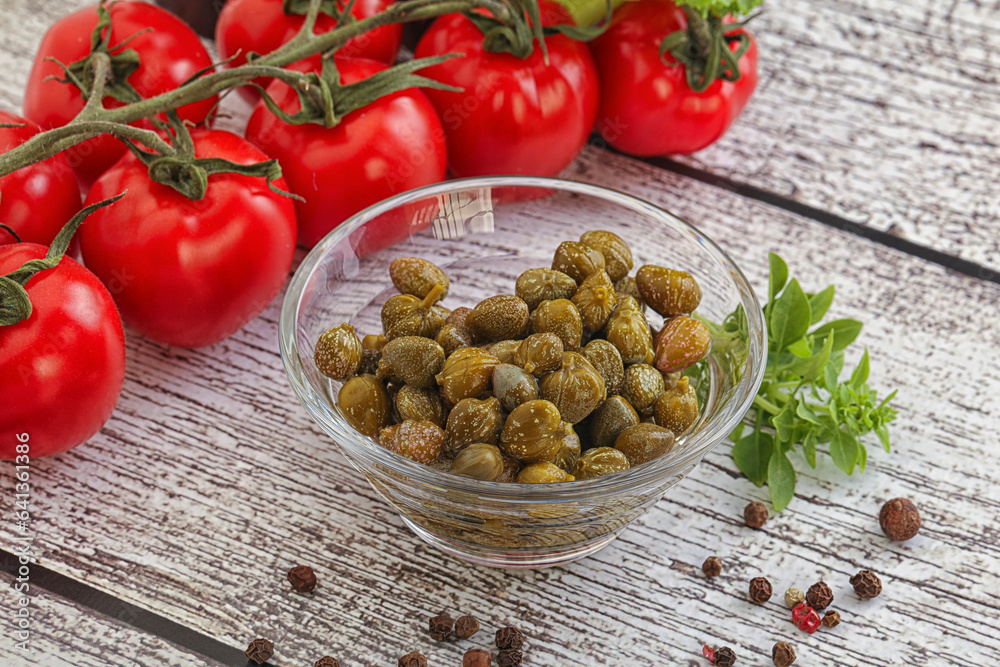 Marinated green capers in the bowl Marinated green capers in the bowl