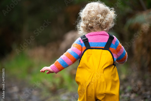 toddler walking on a hike in a park © Phoebe