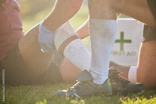 Bilde på lerret First aid, sport injury and hands on leg with rugby accident, fitness and massage on a field