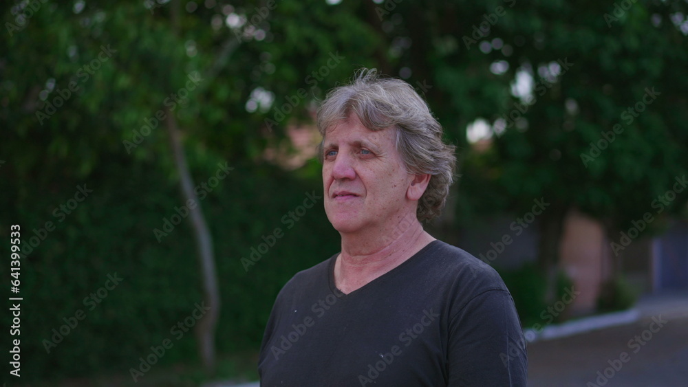 Close-up of Joyful Elderly Caucasian Man Enjoying a Walk in Urban Environment, Tracking Shot Close-up of Joyful Elderly Caucasian Man Enjoying a Walk in Urban Environment, Tracking Shot