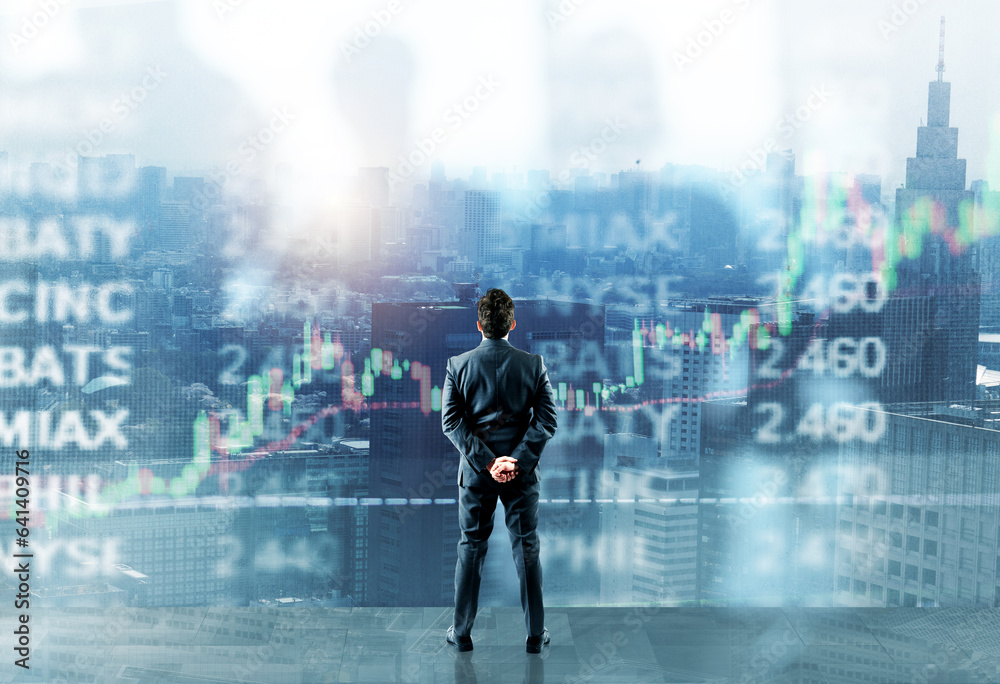 Fototapeta premium Businessman looks far for future and new trading opportunities