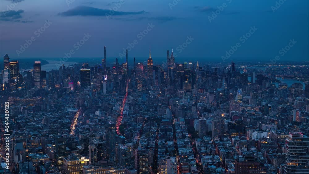 Day to Night Timelapse Sunset with Pink and Blue Sky Over Midtown Manhattan Day to Night Timelapse Sunset with Pink and Blue Sky Over Midtown Manhattan