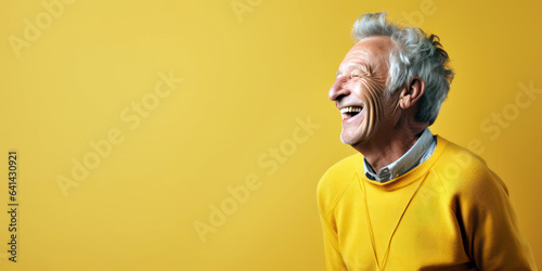 elderly man's laugh lines, telling a story of a life well-lived, against a pale yellow background, room for copyspace