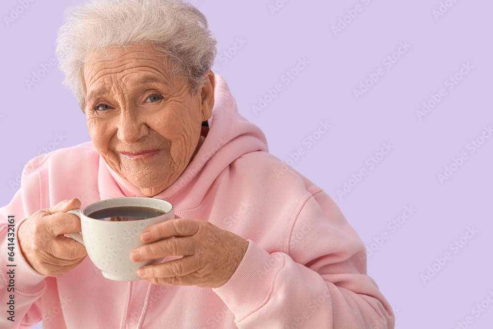 Senior woman with cup of hot coffee on lilac background, closeup Senior woman with cup of hot coffee on lilac background, closeup