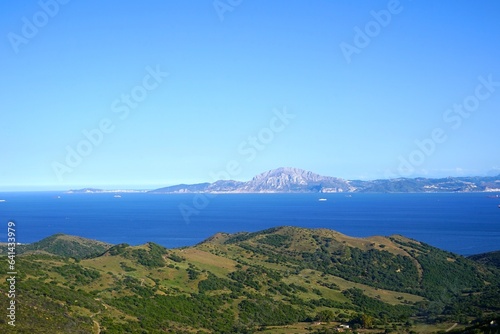 View from the Mirador del Estrecho viewpoint between Tarifa and Algeciras in Andalusia across the Strait of Gibraltar to Morocco with the Jbel Musa mountain and Ceuta, Spain