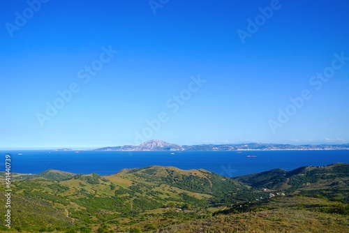 Vista desde el Mirador del Estrecho entre Tarifa y Algeciras en Andalucía a través del Estrecho de Gibraltar hasta Marruecos con la montaña Jbel Musa y Ceuta, España photo