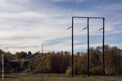 power poles in fields during autumn