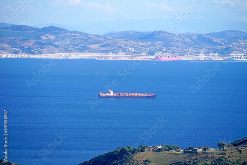 mountains of Morocco and Port de Tanger at the Strait of Gibraltar seen from a viewpoint near Algeciras in Andalusia, Spain