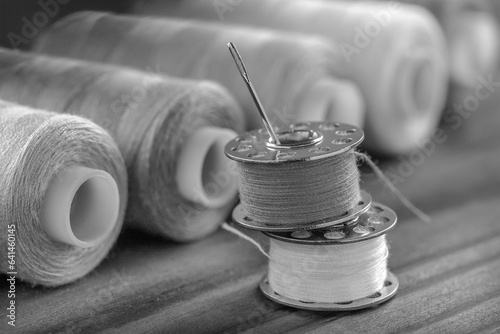 Black and white sewing kit. bobbin threads,