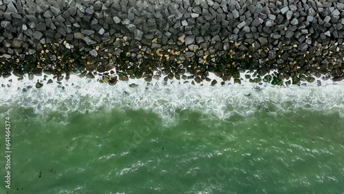 Atlantic ocean beach. Sea waves. Cinematic drone flight. South of England photo