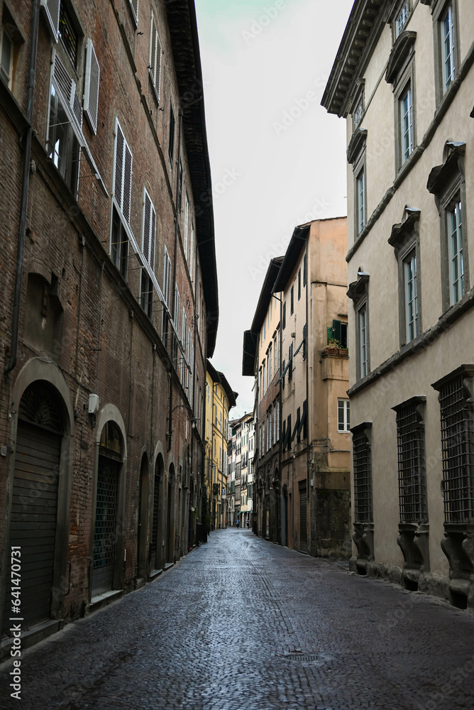 Narrow street in the italian town. Streets in town Lucca