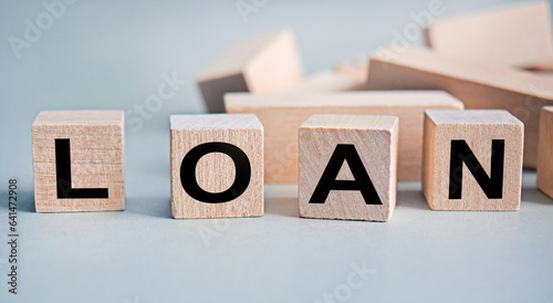 LOAN - the inscription on wooden cubes on a white background