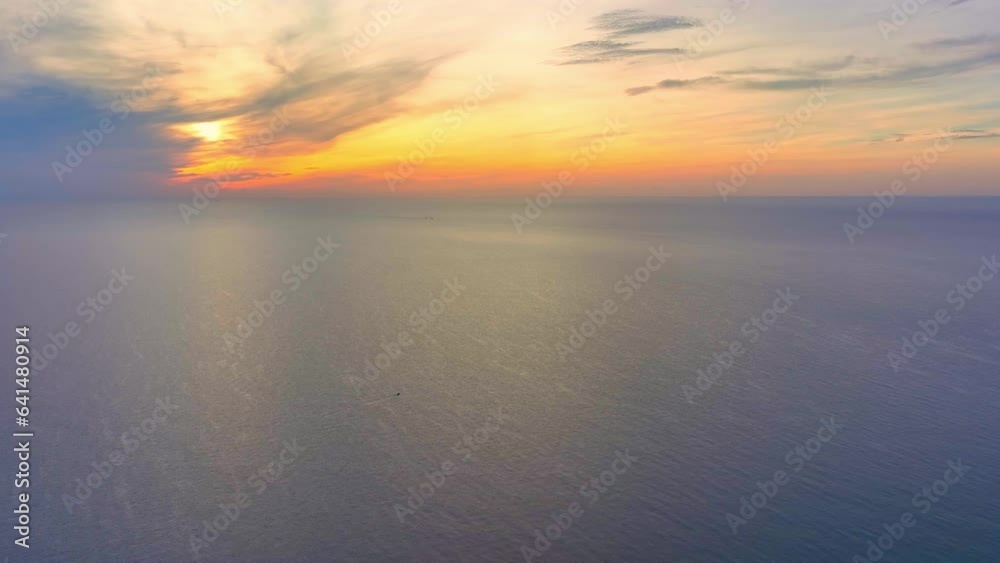 The world transforms into a breathtaking tapestry of colors and contrasts. From the vantage point of a drone soaring high above, the meeting of the sea and sky during sunrise. Thailand.
The world transforms into a breathtaking tapestry of colors and contrasts. From the vantage point of a drone soaring high above, the meeting of the sea and sky during sunrise. Thailand.