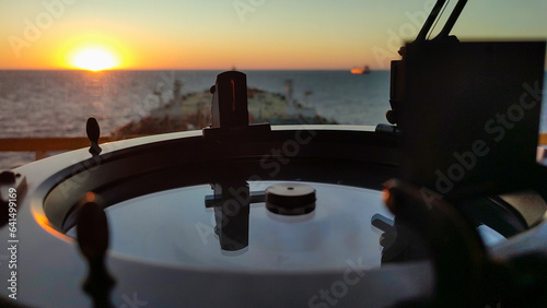 Correcting the compass for the sun on a cargo ship