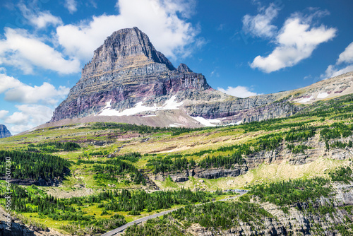 Clements Mountain and Going-To-The Sun road winding up to Logan Pass Visitor Center in Glacier National Park, Montana. Clements Mountain is located in the Lewis Range. photo