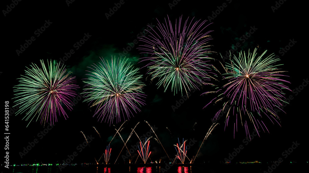 Beautiful fireworks, International Firework Festival in Pattaya, Thailand. Nov 25-26, 2022. on isolated black background. Beautiful fireworks, International Firework Festival in Pattaya, Thailand. Nov 25-26, 2022. on isolated black background.