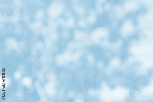 Light blue blurred bokeh abstract for background.