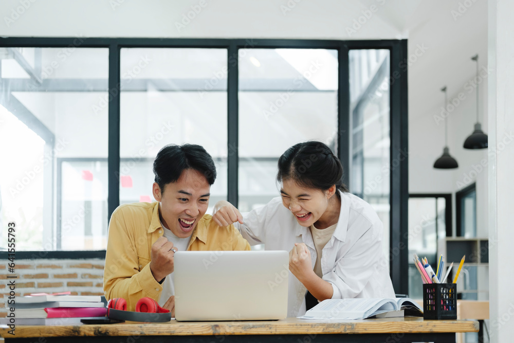 Motivated multinational team raise high fives on briefing after finding problem solution as successful brainstorm result. Motivated multinational team raise high fives on briefing after finding problem solution as successful brainstorm result.