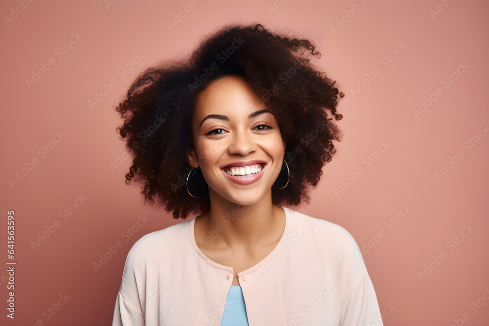 portrait of black woman smiling in a studio, plain colour background portrait of black woman smiling in a studio, plain colour background