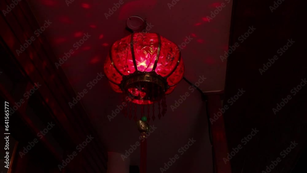 Video of Chinese lantern spinning with lights. Concept of Chinese culture and objects.