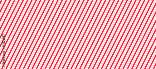 Red and pink Christmas seamless pattern. Candy cane diagonal stripes background. Repeating decoration wallpaper. Winter holidays lines backdrop. Xmas peppermint present wrapping print design. Vector