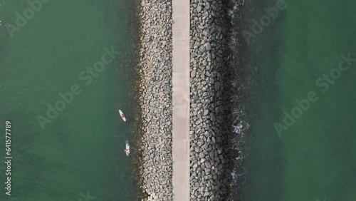 Reyna Beach Pier In Constanța, Romania - aerial top down photo