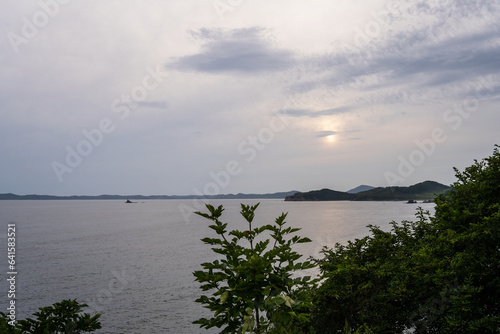 Sea and mountain range. large rocks on the beach and in the ocean. Cliff by the sea. Selective focus.