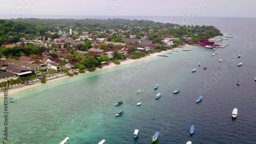 Aerial view of Gili Trawangan, West Nusa Tenggara. Panoramic showcasing architecture, coastal, boats, beach, and natural beauty.