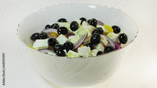 The process of preparing Greek salad. Stop motion.