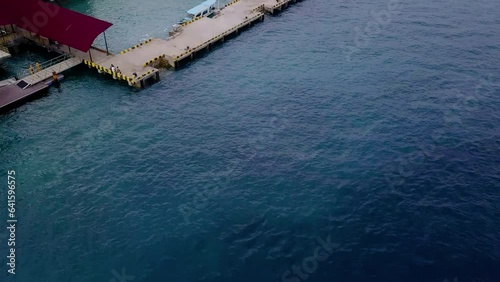 Aerial view of Gili Trawangan, West Nusa Tenggara. Panoramic showcasing architecture, coastal, boats, beach, and natural beauty.