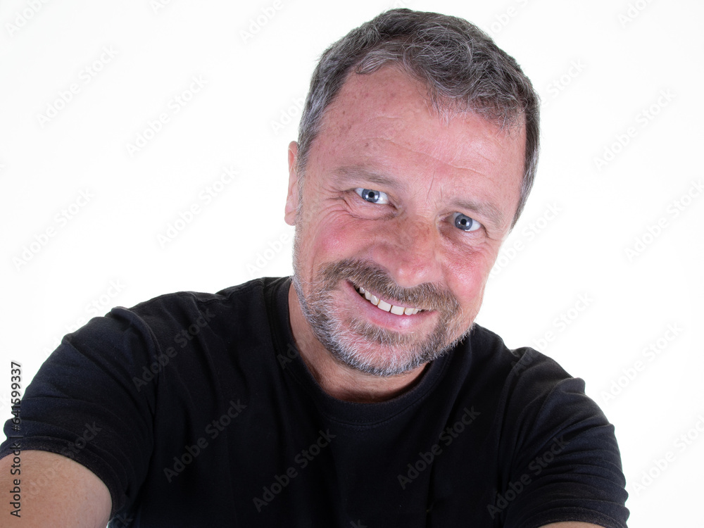 handsome beard smiling man fifty making camera picture smartphone selfie with cell phone on white background handsome beard smiling man fifty making camera picture smartphone selfie with cell phone on white background