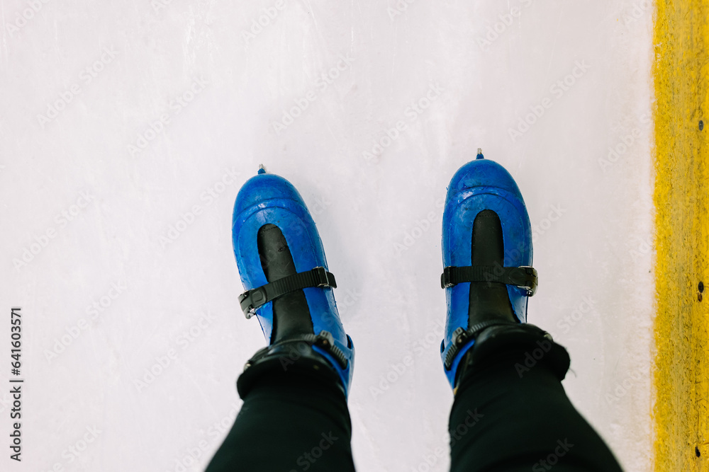 Closeup ice skating skating shoes at the ice rink