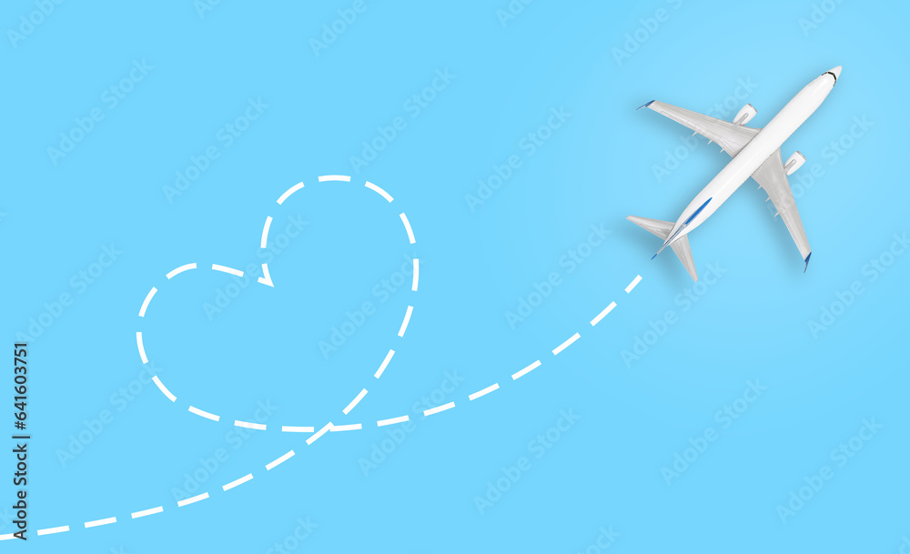 Airplane model with line trace in heart shape on blue background - obrazy, fototapety, plakaty 