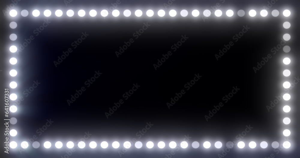 Abstract beauty frame of glowing white lights and light bulbs glowing bright magical energy on a black background