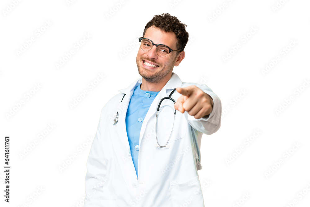 Brazilian doctor man over isolated chroma key background points finger at you with a confident expression Brazilian doctor man over isolated chroma key background points finger at you with a confident expression