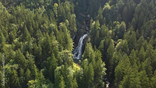 Establishing aerial of Golllinger waterfall, gorgeous Austria fall, dolly out photo