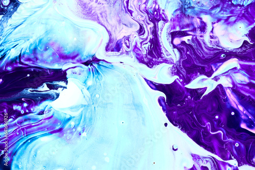 Blue and purple flowing paint texture. Marbled paper abstract background