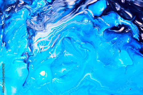 Blue and purple flowing paint texture. Marbled paper abstract background