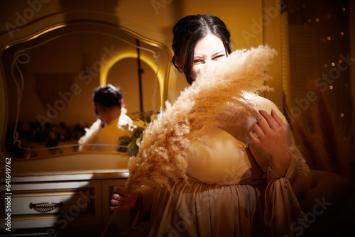 Obraz na plátně Portrait of Owerweight elegant Woman at Christmas room