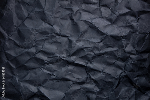 black crumpled paper background