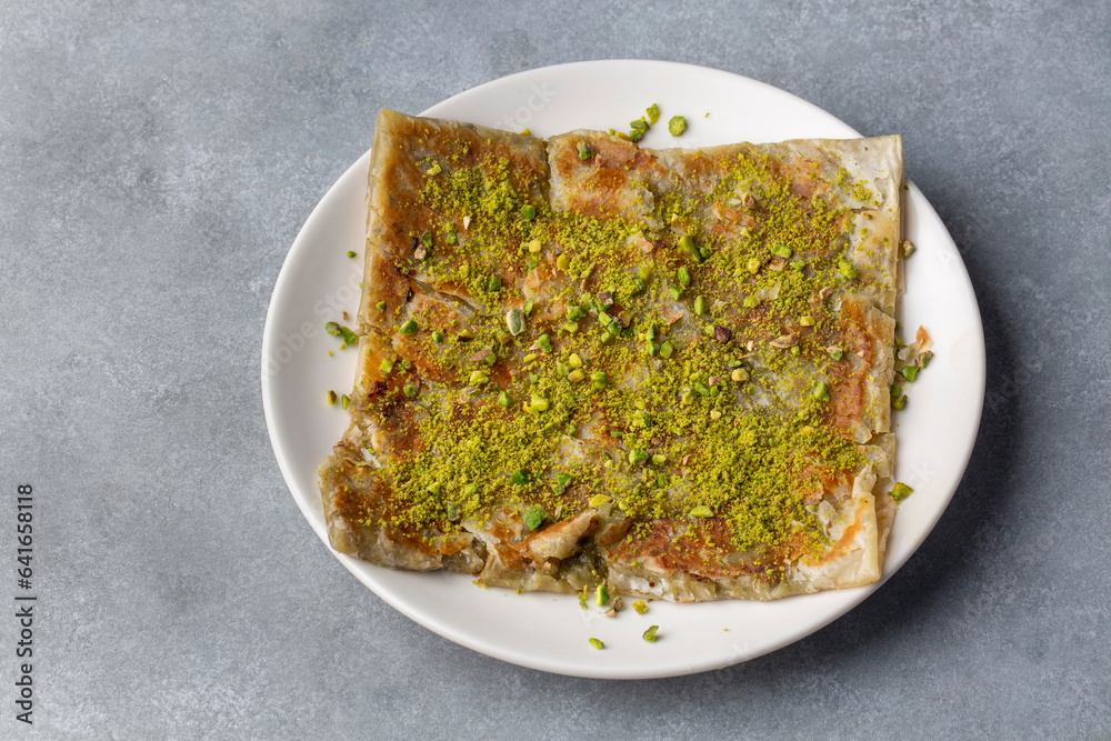 Delicious Turkish Traditional Dessert Katmer From Gaziantep - green pistachio Delicious Turkish Traditional Dessert Katmer From Gaziantep - green pistachio