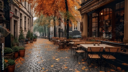 Autumnal cozy street with a coffee shop terrace