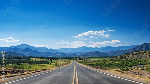 Road to the mountains Asphalt highway road mountain view natural scenery with blue sky © Rames studio
