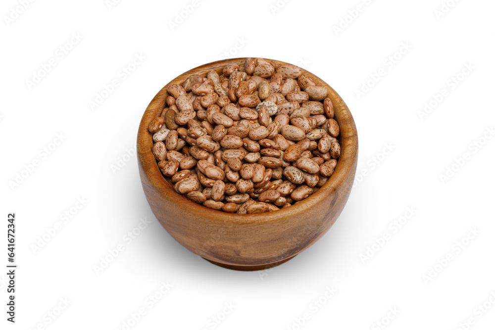 Uncooked kidney bean in wooden bowl on isolated white background. Uncooked kidney bean in wooden bowl on isolated white background.