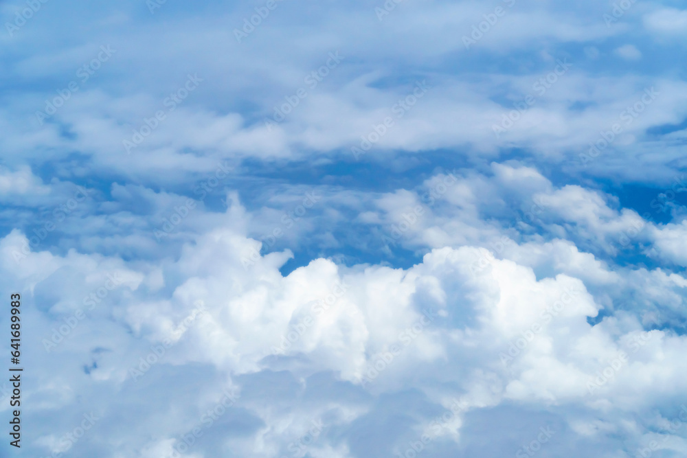 beautiful blue sky with cumulus clouds for abstract background, aerial view