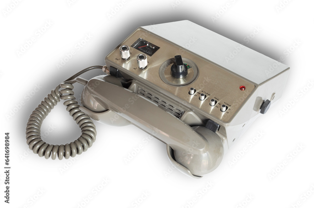 Shadow beind a Two way radio with a telephone handset Shadow beind a Two way radio with a telephone handset