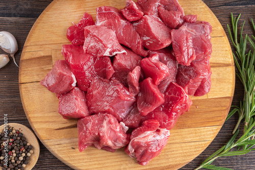 Top view of raw sliced beef or lamb meat.
