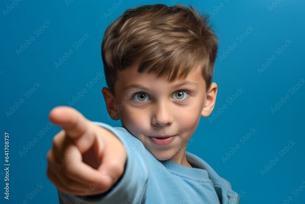 Medium shot portrait photography of a tender boy in his 30s making a i see you gesture pointing at one's eyes against a cerulean blue background. With generative AI technology Medium shot portrait photography of a tender boy in his 30s making a i see you gesture pointing at one's eyes against a cerulean blue background. With generative AI technology
